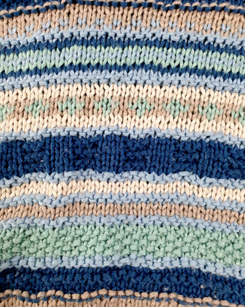 HAND KNITTED SLIPOVER WITH BLUE STRIPED PATTERN