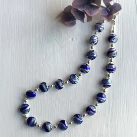 Necklace with dark blue and cornflower swirl over white gold Murano glass small lentil beads on silver